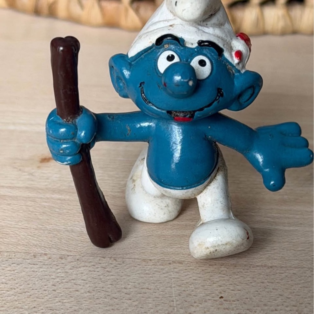 Blue and White Smurf Toy Figure